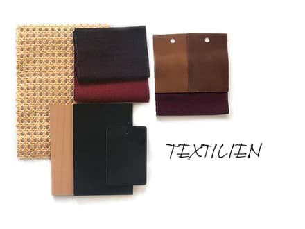 Verschiedene Textil- und Materialproben mit Text 'Textilien'.