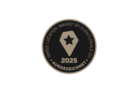 Swiss Location Award 2025 Emblem in Schwarz und Gold.