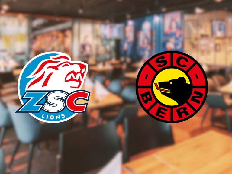 Logos von ZSC Lions und SC Bern in einem Restaurant-Hintergrund.