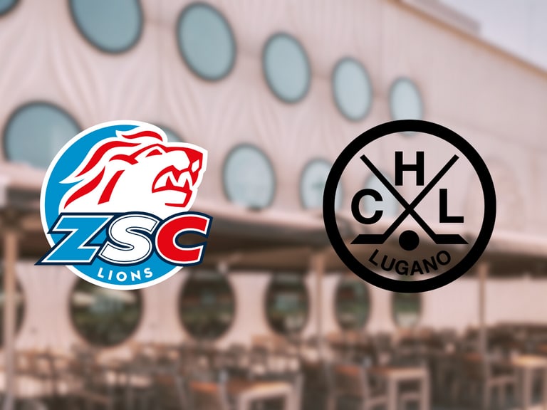 Logos von ZSC Lions und HC Lugano vor einem Gebäude.